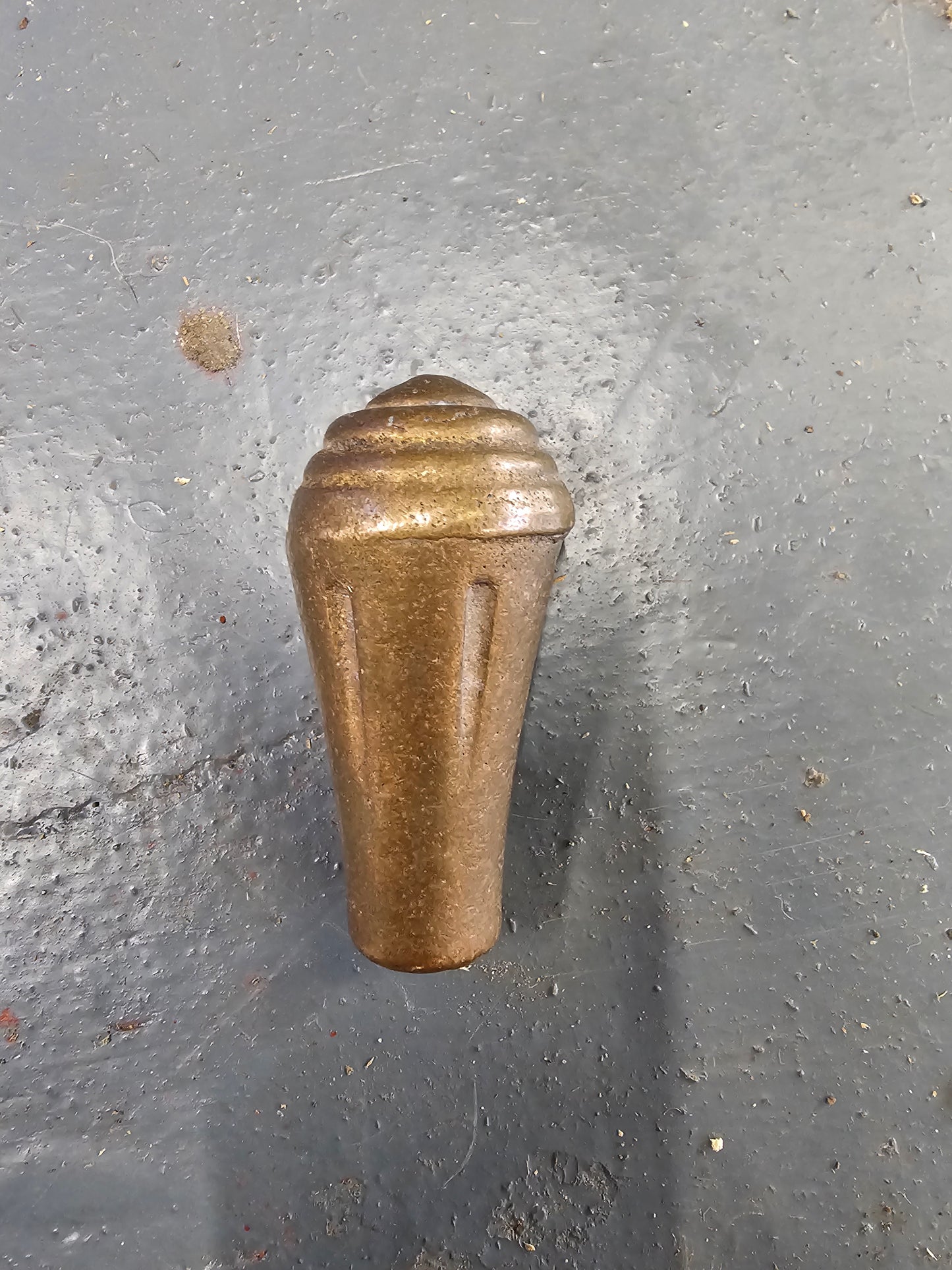 Brass knob. Would make a really nice shifter handle