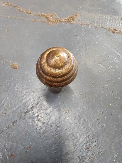 Brass knob. Would make a really nice shifter handle