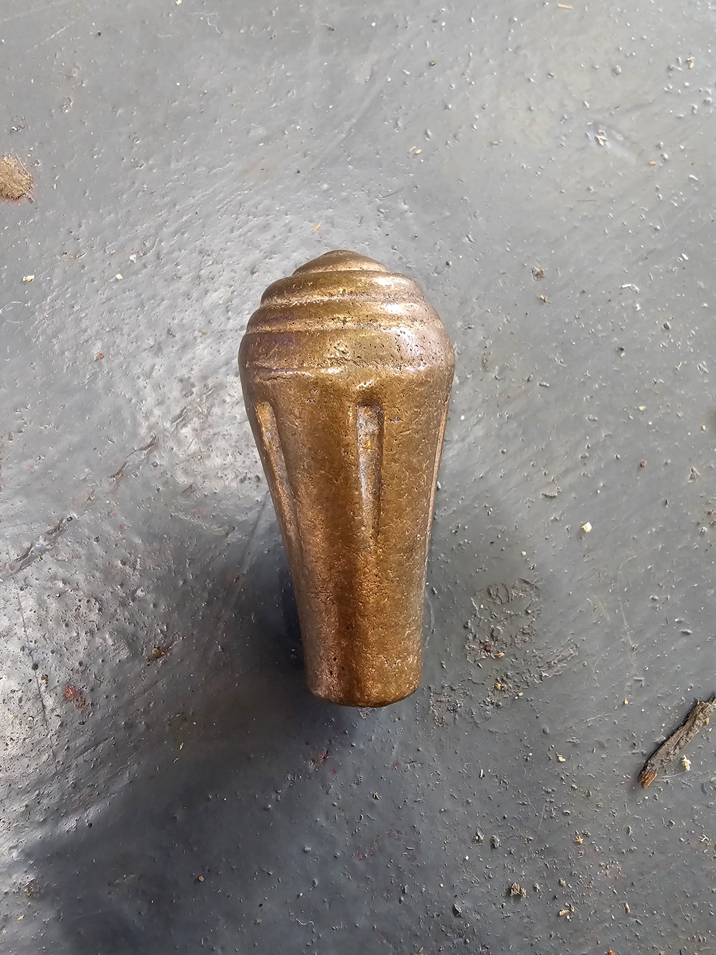 Brass knob. Would make a really nice shifter handle
