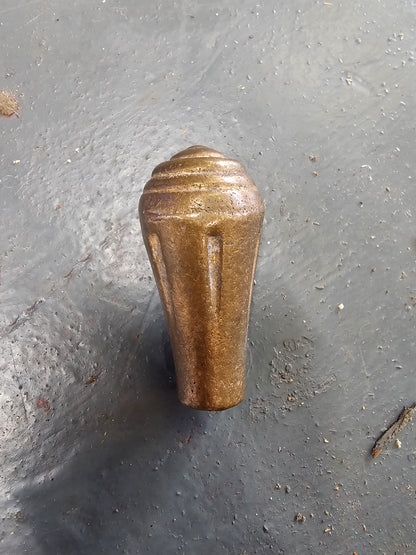 Brass knob. Would make a really nice shifter handle